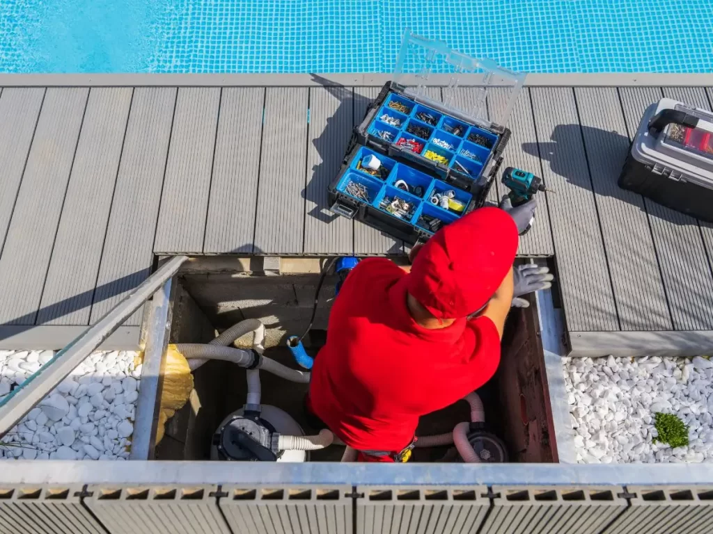 man working on a pool